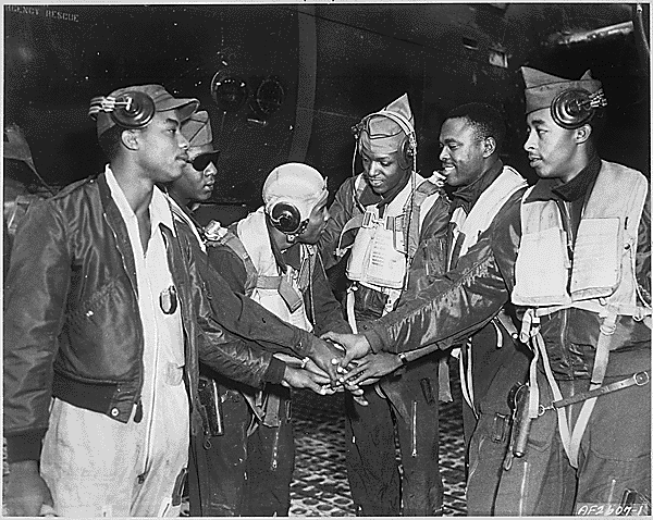 Six gunners join hands as a part of 17th Bomb Wing night interdiction teams in Korea, ca. 09/1952. Credit: National Archvies