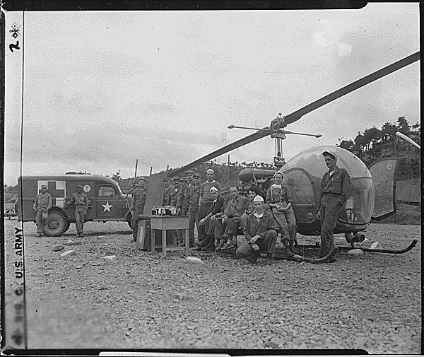Personnel and equipment needed to save a man’s life are assembled at HQs of the 8225th Mobile Army Surgical Hospital, Korea., 10/14/1951. Credit: National Archives