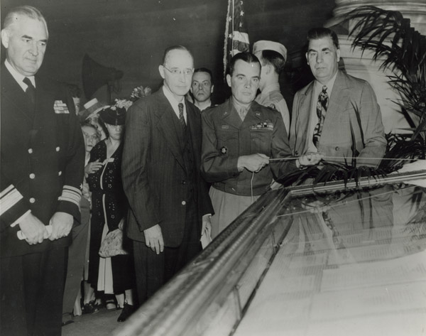 General Mcauliffe Unveiling the German Surrender Documents in the Rotunda of the National Archives, June 6, 1945. Credit: National Archives.