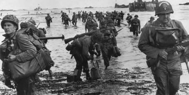 Infantrymen wading ashore from an LCT. Image and caption credit: Center of Military History. U.S. Army