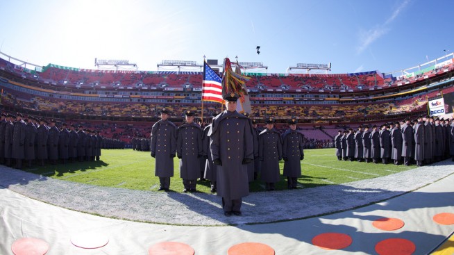 The Corps of Cadets and the West Point Band march on to the FedEx Field for the 112th annual Army/Navy Game. Photo by Tommy Gilligan/West Point Public Affairs. Caption: West Point Public Affairs.