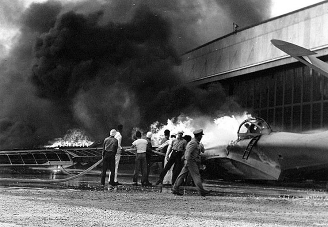 PBY patrol bomber burning at Naval Air Station Kaneohe, Oahu, during the Japanese attack. Official U.S. Navy Photograph, National Archives Collection. Caption: Naval History & Heritage Command.