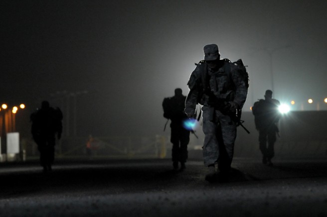 Soldiers with 1st Battalion, 18th Infantry Regiment, 2nd Advise and Assist Brigade, 1st Infantry Division, United States Division-Center, make their way along the course of a 12-mile ruck march as part of a unit competition at Camp Taji, Iraq, May 27, 2011, for the opportunity to attend Ranger School. The competition included the ruck march as well as testing on weapons tasks, map reading and other tactical skills and was designed to give the prospective Ranger candidates a small taste of the physical and mental requirements of Ranger School. Credit: Sgt. 1st Class Jon Soucy, DVIDSHUB.