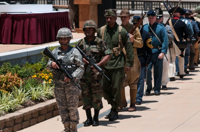 Soldiers wear period uniforms during the Army's 238th birthday at the U.S. Army Forces Command and U.S. Army Reserve Command headquarters, June 13, 2013, at Fort Bragg, N.C. The combined FORSCOM/USARC ceremony included music from the Army Ground Forces Band and Soldiers dress in period uniforms depicting the 238 year history of the U.S. Army. Image credit: Timothy Hale. Caption credit: U.S. Army Flickr feed.