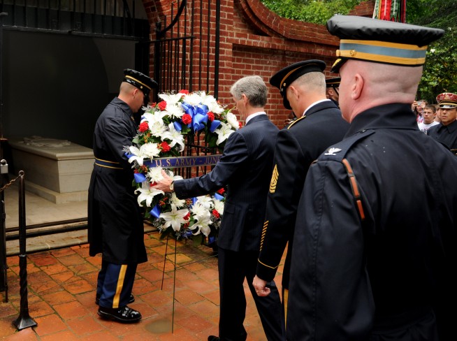 U.S. Army Sgt. 1st Class Brody O'Farrell, left, a platoon sergeant and Commander in Chief's Guard, assigned to the 3rd U.S. Infantry Regiment (The Old Guard) and Secretary of the Army John McHugh, center, lay a wreath at the tomb of Gen. George Washington at Mount Vernon, Va., June 10, 2013. The wreath laying ceremony was conducted to commemorate the upcoming U.S. Army's 238th birthday observance, June 14. Image credit: Sgt. Jose A. Torres Jr. Caption credit: DVIDSHUB