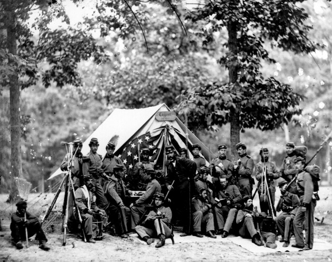 Engineers of the 8th New York State Militia in front of a tent, 1861. Image and caption credit: National Archives.