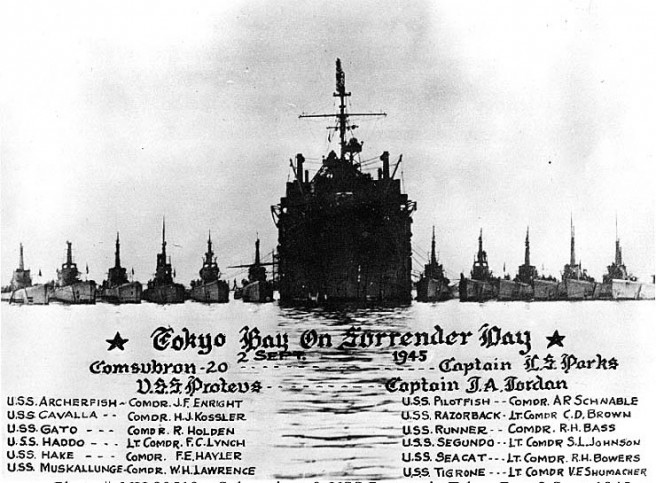 USS Proteus (AS-19) With submarines of Submarine Squadron 20 alongside in Tokyo Bay, on VJ-Day, 2 September 1945. Names of the submarines present, their commanding officers and the commanding officers of SubRon20 and USS Proteus are printed at the bottom of the image. Credit: Naval Historical Center.
