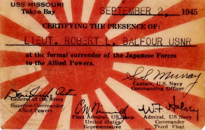 Wallet card souvenir of the occasion, issued to Lieutenant Robert L. Balfour, USNR, a member of Admiral Halsey's staff. These cards were designed by Chief Shipfitter Donald G. Droddy and produced by USS Missouri's print shop. One was issued to each man who was on board the ship on 2 September 1945, when the surrender of Japan was formalized on her decks. The cards contain the facsimile signatures of Captain Stuart S. Murray, ship's Commanding Officer, General of the Army Douglas MacArthur, Fleet Admiral Chester W. Nimitz and Admiral William F. Halsey. Credit: Naval Historical Center.