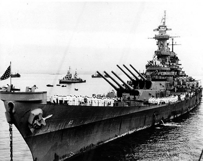 USS Missouri, anchored in Tokyo Bay, Japan, 2 September 1945, the day that Japanese surrender ceremonies were held on her deck. Naval Historical Center.