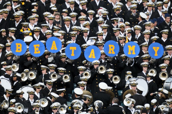 PHILADELPHIA (Dec. 6, 2008) U.S. Naval Academy midshipmen cheer the U.S. Naval Academy Midshipmen during the 109th Army-Navy college football game at Lincoln Financial Field in Philadelphia. (U.S. Navy photo by Senior Chief Mass Communication Specialist Todd Cichonowicz. Caption: U.S. Navy