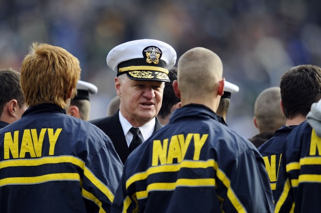 PHILADELPHIA (Dec. 6, 2008) Chief of Naval Operations (CNO) Adm. Gary Roughead congratulates a group of Navy recruits sworn into the Navy before the second quarter of the 109th Army-Navy college football game at Lincoln Financial Field in Philadelphia. (U.S. Navy photo by Mass Communication Specialist 2nd Class Kristopher Wilson. Caption: U.S. Navy.