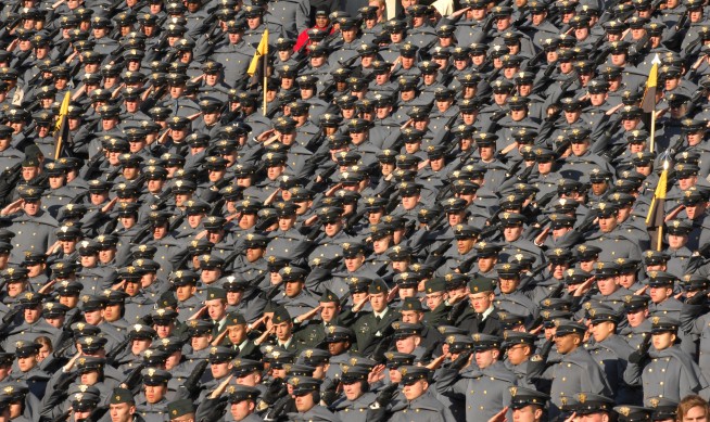 Cadets from the U.S. Military Academy at West Point, N.Y., render honors during the playing of the national anthem before the start of the 110th Army Navy game at Lincoln Financial Field in Philadelphia, Pa., Dec. 12, 2009. Photo Credit: 1st Sgt. Robert Hyatt. Caption: U.S. Army. 