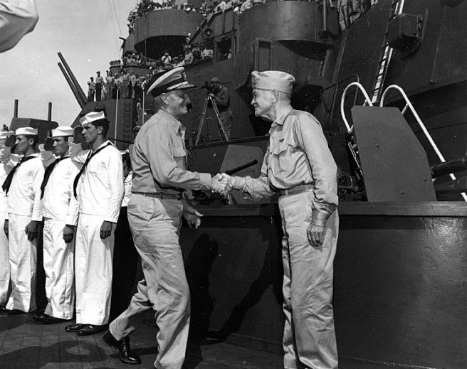 Admiral William F. Halsey, Commander, Third Fleet (right) Welcomes Fleet Admiral Chester W. Nimitz aboard USS South Dakota (BB-57), in Tokyo Bay, 29 August 1945, after Nimitz flew in from Saipan. Both attended the Japanese surrender ceremonies on USS Missouri (BB-63) a few days later. Credit: Naval Historical Center.