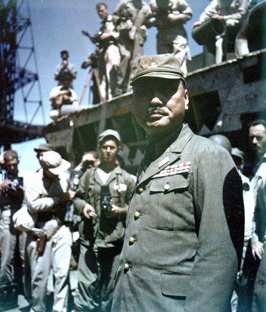 Japanese Vice Admiral Michitoro Tozuka, Yokosuka Naval Base Commander, photographed just after he had surrendered the facility to Rear Admiral Robert B. Carney, U.S. Third Fleet Chief of Staff, on 30 August 1945. Credit: Naval Historical Center.