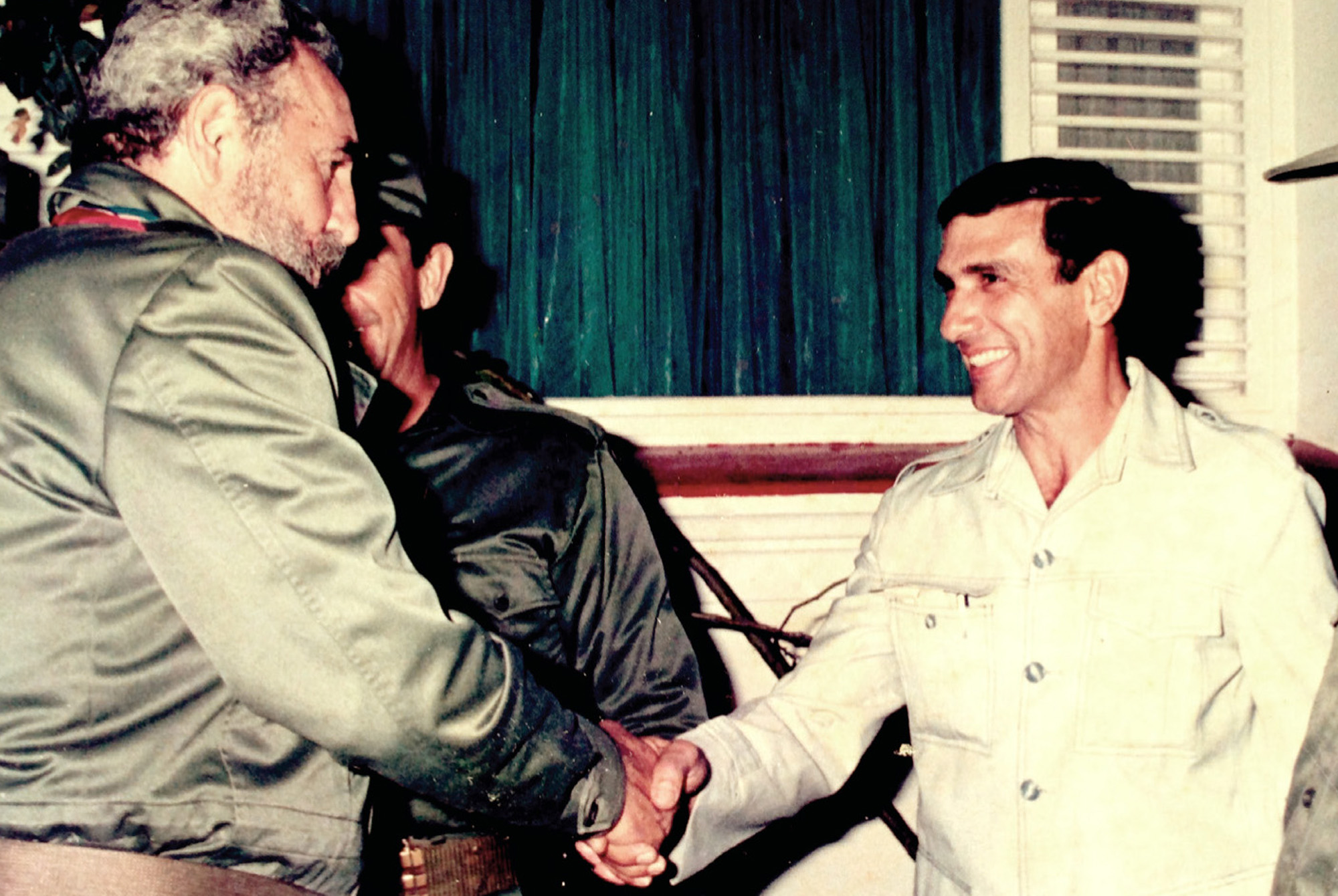 Juan Reinaldo Sanchez Shaking Fidel Castro's Hand