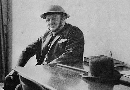 Churchill wears a helmet