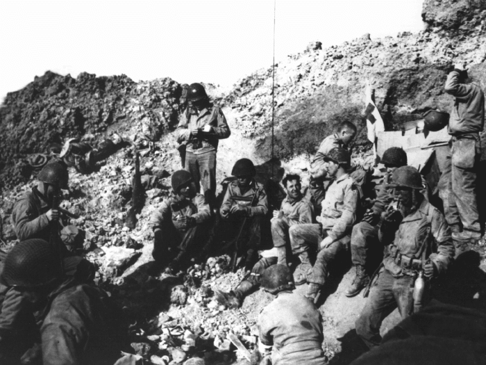 Soldiers resting at Pointe du Hoc