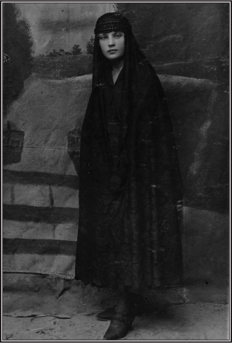 Lillian Chanales, portrait of author's grandmother pictured in mourning attire after husband's death.