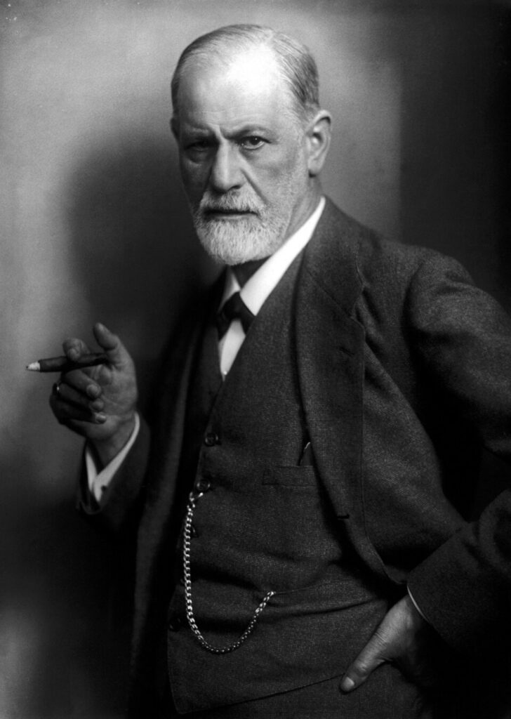  Sigmund Freud, founder of psychoanalysis, holding a cigar. Photographed by his son-in-law, Max Halberstadt, c. 1921 Photo courtesy of Wikimedia Commons.